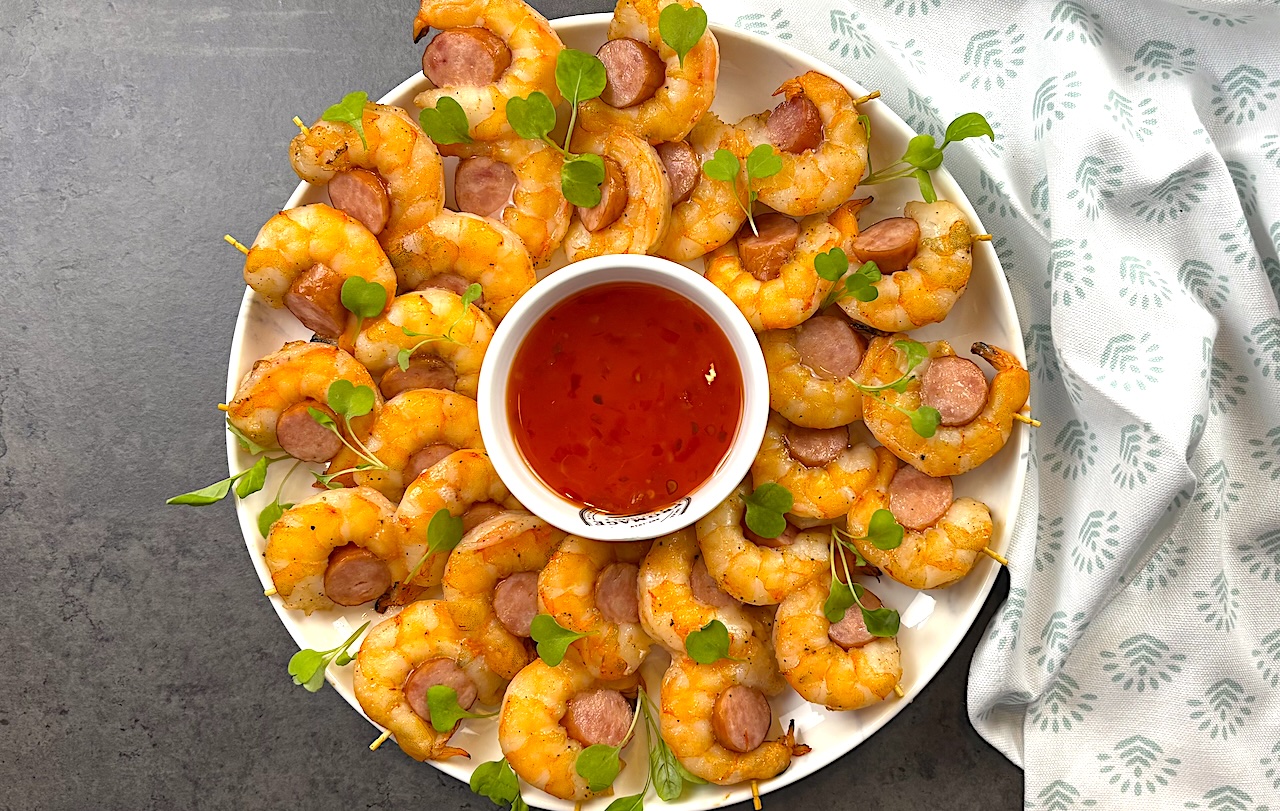 Combining smoky sausage and succulent shrimp in a flavorful blend of spices, this easy-to-make appetizer is perfect for any occasion.
